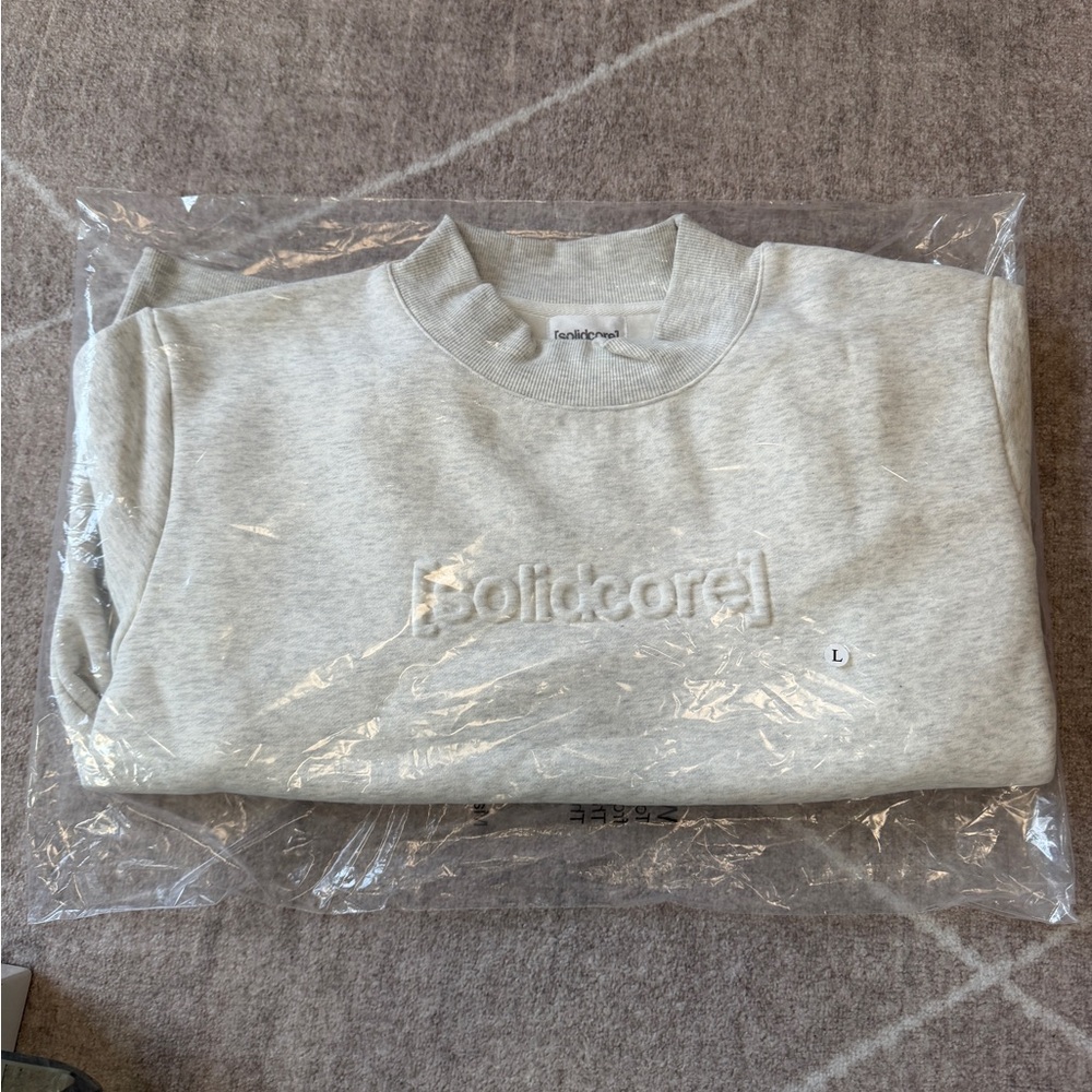 Solidcore Embossed Logo Crewneck Sweatshirt - Light Gray **MEMBERS ONLY***
